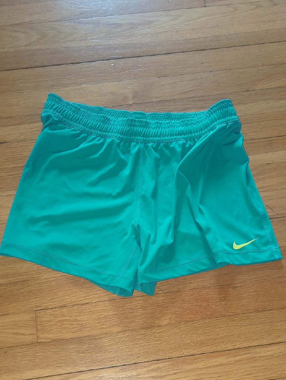 Nike Women's Teal Athletic Shorts with Neon Swoosh